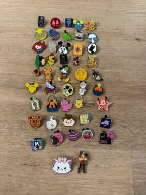 47 Disney trading assorted pins
- exact photo